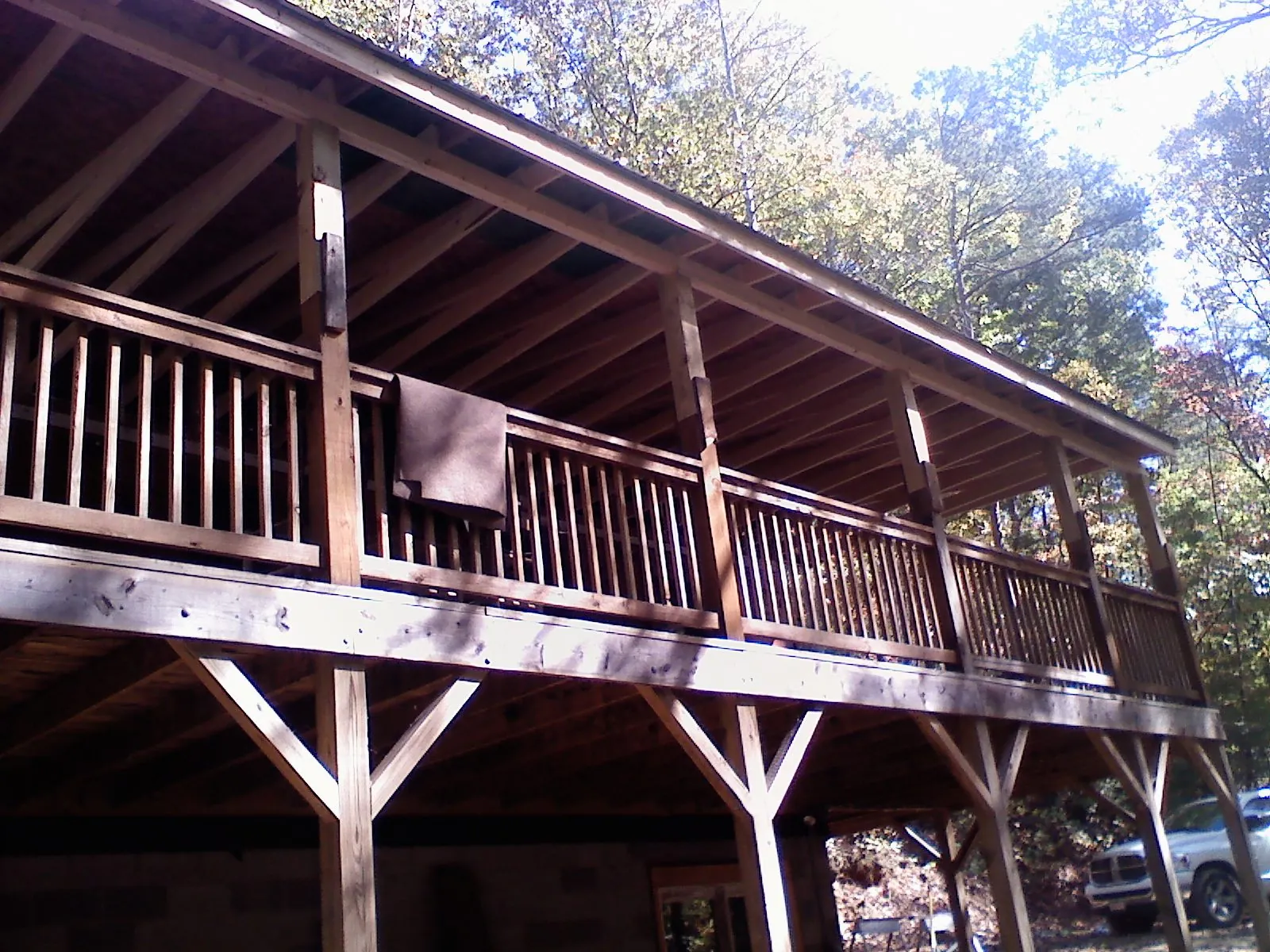 Timber framing under a new elevated porch and deck — Roof Leak Repair in Holt by Roofing Brothers